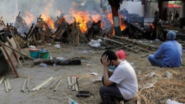 বিশ্বজুড়ে কিছুটা কমেছে করোনায় প্রাণহানি
